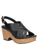Elegante sandalia negra de cuero femenino, estilo casual, perfecta para días calurosos.
