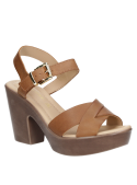 Sandalia de mujer en cuero camel con plataforma, correa ajustable en el tobillo y tiras entrelazadas en el empeine.