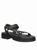 Sandalia de cuero negro para mujer, estilo moderno con detalles de tachas.