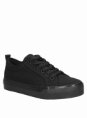 Zapatilla unisex de niño en color negro, estilo normcore, perfecta para paseos al parque y encuentros sociales relajados.