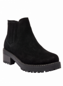 Botín de mujer en cuero gamuzado negro, diseño chelsea con elástico lateral, perfecto para un look urbano y casual.