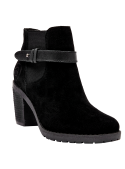 Calzado de cuero gamuzado negro, ideal para mujeres que buscan versatilidad y estilo en un botín casual chic.