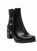 Botín negro de cuero para mujer, combinación de funcionalidad y estilo, adecuado para múltiples ocasiones.