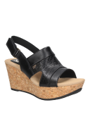 Sandalia de cuero negra para mujer, diseño informal con taco cuña cómodo.