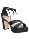 Sandalia negra de cuero para mujer, perfecta para bodas o cenas elegantes, con diseño moderno y comodidad al caminar.