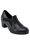 Calzado negro de cuero para mujer, semi-formal y elegante, con puntera redondeada y tacón medio para reuniones.