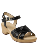 Sandalia negra de cuero para mujer, hebilla metálica ajustable en el tobillo, perfecta para ocasiones casuales.