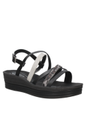 Sandalia negra de mujer con diseño moderno y plataforma, ideal para un look relajado y estiloso en salidas casuales.