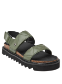 Sandalia verde de cuero para mujer con suela gruesa y dentada, diseño chunky que ofrece altura y tracción.