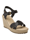 Calzado casual chic de cuero negro, combina con vestidos o jeans para eventos al aire libre.