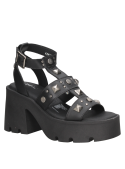 Sandalia casual de cuero negro para mujer, combina con jeans desgastados o faldas asimétricas para un look alternativo.