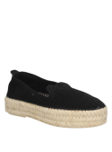 Alpargata negra de cuero para mujer, estilo casual, diseño minimalista y plataforma de yute trenzado.