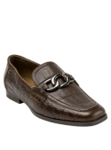 Calzado de cuero marrón para mujer, diseño clásico de mocasín, ideal para un look casual chic y eventos formales.