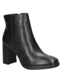 Botín minimalista de cuero negro para mujer, elegante y cómodo, ideal para oficina y eventos casuales.