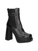 Botín de cuero negro Chelsea para mujer, ideal para un look vanguardista en contextos urbanos y eventos semi-formales.