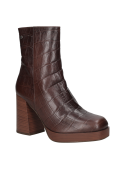 Sofisticado botín de cuero marrón estilo casual para mujer, con tacón estable, ideal para moda urbana y oficina.