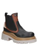 Botín de cuero negro estilo Chelsea para mujer, mezcla de silueta clásica y detalles contemporáneos para un look urbano.
