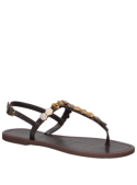 Sandalia de cuero marrón para mujer, estilo casual, ideal para días de verano, con diseño moderno.