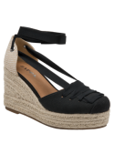 Calzado femenino negro con diseño artesanal moderno, ideal para el verano.