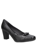 Zapato de cuero negro, estilo casual para mujer, con detalle de lazo en el empeine y punta redondeada.