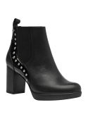 Botín Chelsea de cuero negro para mujer, con tachas y elástico lateral, ideal para uso formal y casual.