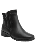 Botín de cuero negro para mujer con costuras discretas, acabado pulcro y sofisticado, ideal para largas caminatas.