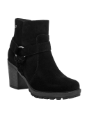 Botín negro de cuero para mujer, versátil y elegante, con taco robusto y textura suave tipo gamuza.