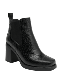Botín Chelsea negro de cuero para mujer con diseño texturizado que imita piel de reptil, ofreciendo un toque sofisticado.