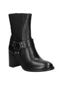 Cuero negro en botín de mujer, con cierre elástico oculto y diseño moderno, ideal para un uso prolongado y confortable.