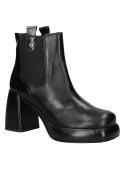 Botín Chelsea negro de cuero para mujer con diseño elegante, tacón ancho y caña media que ofrece soporte y protección.