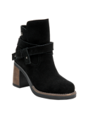 Botín casual boho-chic negro de cuero para mujer con tacón cuadrado y robusto, ideal para un estilo moderno y desenfadado.