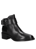 Botín negro de cuero para mujer, suela robusta y versátil, ideal para ocasiones formales y diarias.