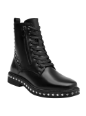 Botín negro de cuero con tachas metálicas, ideal para un estilo rockero y urbano. Perfecto para moda alternativa.