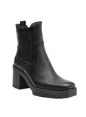 Botín de cuero negro estilo Chelsea para mujer, combina elegancia y comodidad, apto para eventos y reuniones.