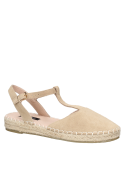 Suela artesanal de esparto en alpargata beige de cuero, combinable con faldas midi.
