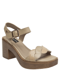 Calzado de cuero beige con diseño elegante y suela de tacón grueso, perfecto para combinar con vestidos.