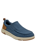 zapatilla slip-on azul con detalles clásicos y suela beige estilosa