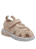 Sandalia de niña en material sintético beige, elegante y minimalista con diseño floral.