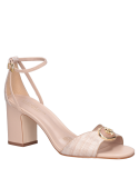 Sandalia rosada de cuero para mujer, perfecta para día o noche con outfits variados.
