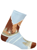 Primer plano de calcetines celestes, mezcla de algodón, poliamida y elastano.