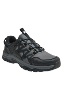 Zapatilla de trekking gris unisex, confeccionada con material sintético resistente al agua.