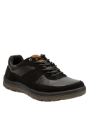 Calzado negro de cuero para hombre, recomendado para estilo casual y relajado.