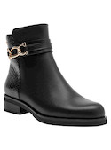 Botín de mujer en cuero negro, acabado sofisticado, ideal para un look vanguardista y urbano.