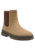 Botín sintético beige para niña, combina con jeans y chaqueta ligera.