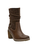 Botas café de cuero para mujer, ofrecen estabilidad y confort en cada paso.