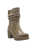 Bota de cuero beige para mujer, diseñada para recorrer nuevos horizontes con estilo y confort.
