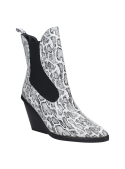 Elegante botín Chelsea en cuero pitón para mujer, con lengüeta trasera que facilita su uso diario en entornos casuales.