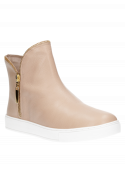 Botín de cuero nude para mujer, perfecto para un estilo informal.